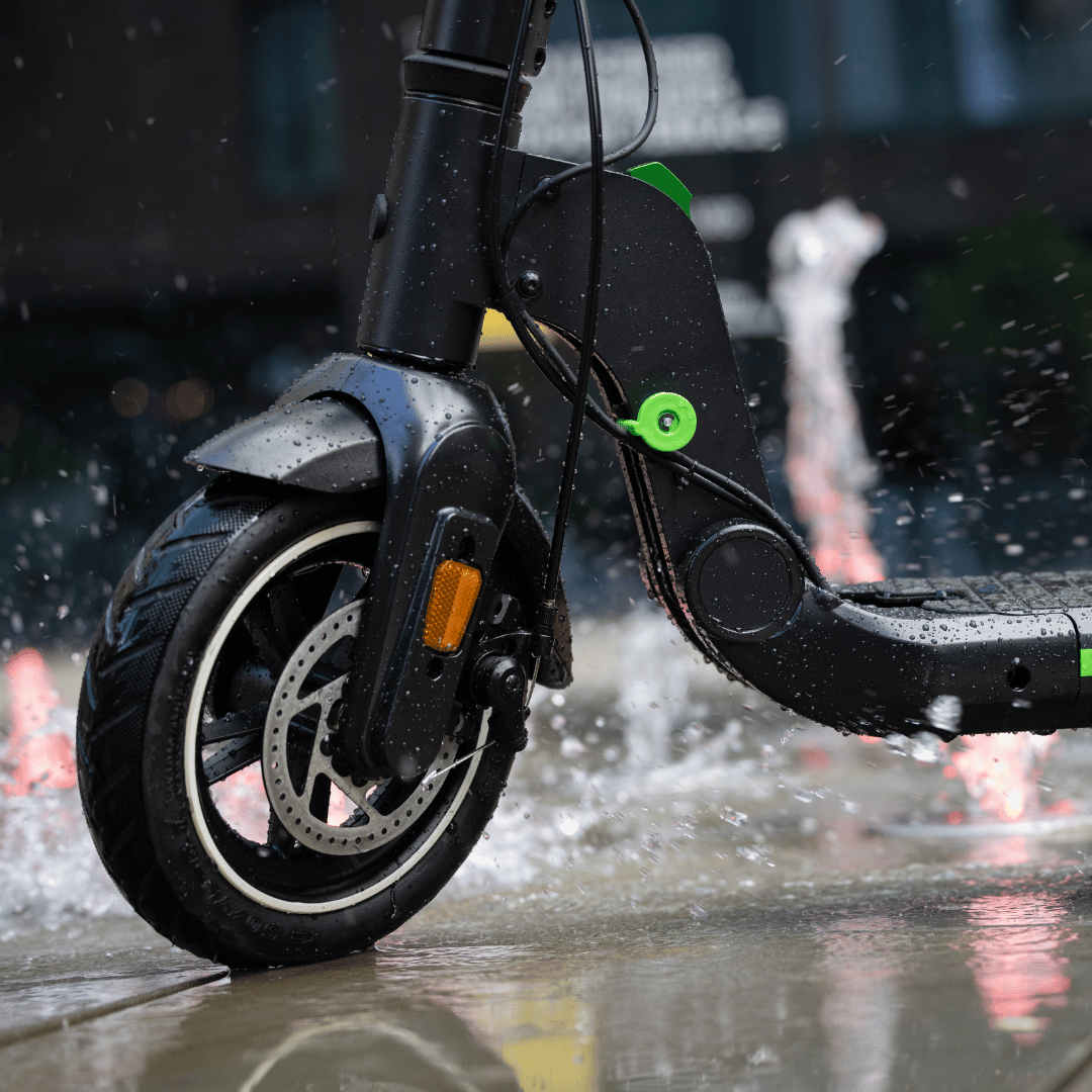 Front wheel of LOCO Lite electric scooter in wet conditions