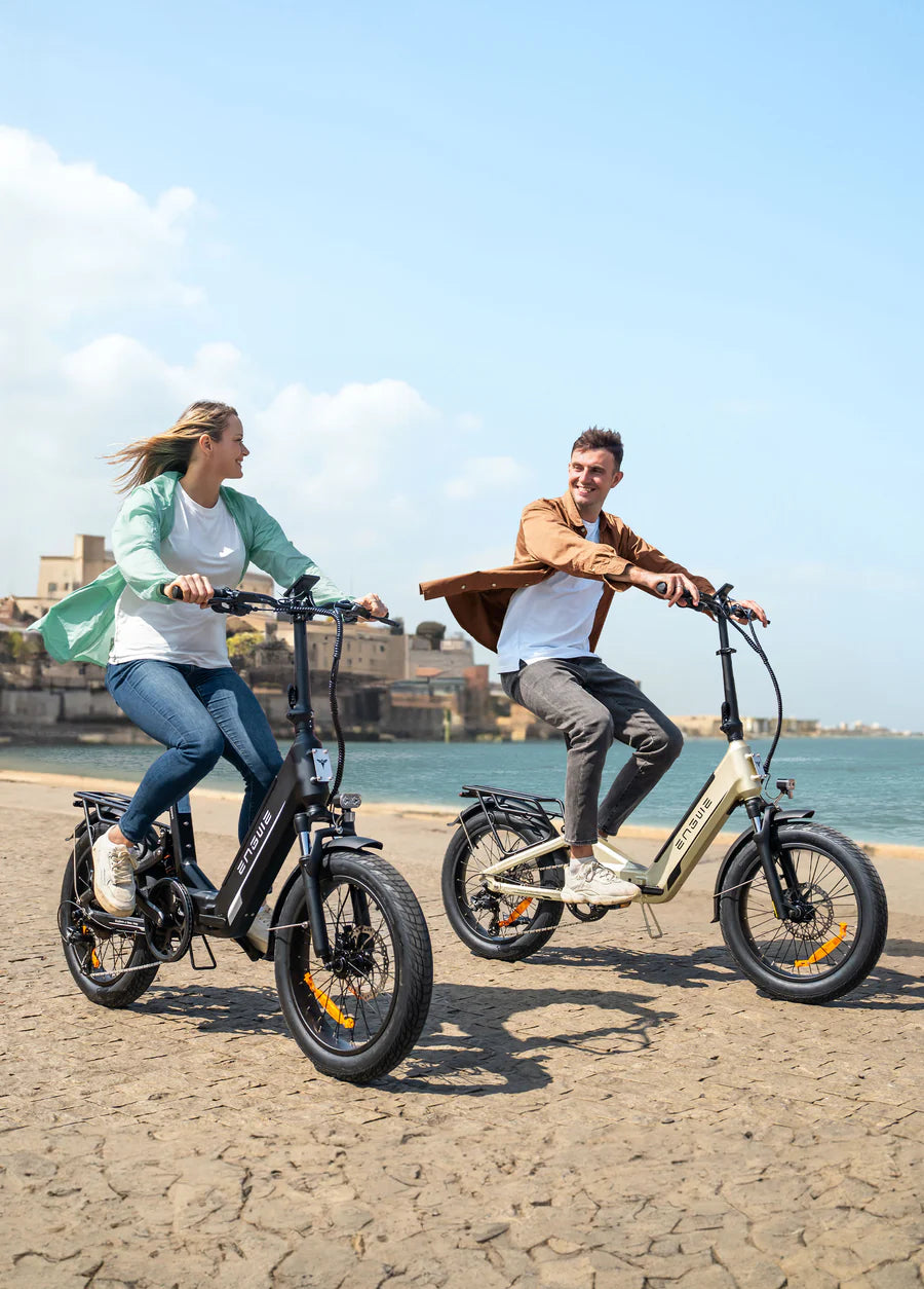 Riders enjoying the Engwe L20 3.0 Boost electric bikes outdoors