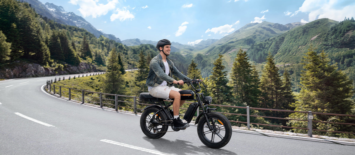 Engwe M1 dual battery fat tyre electric bike on a mountain road